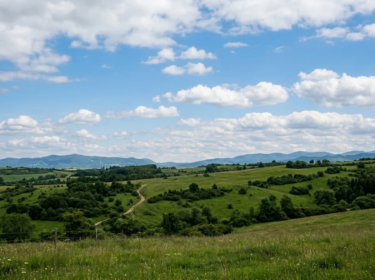 The landscape with power lines removed and clean sky restored